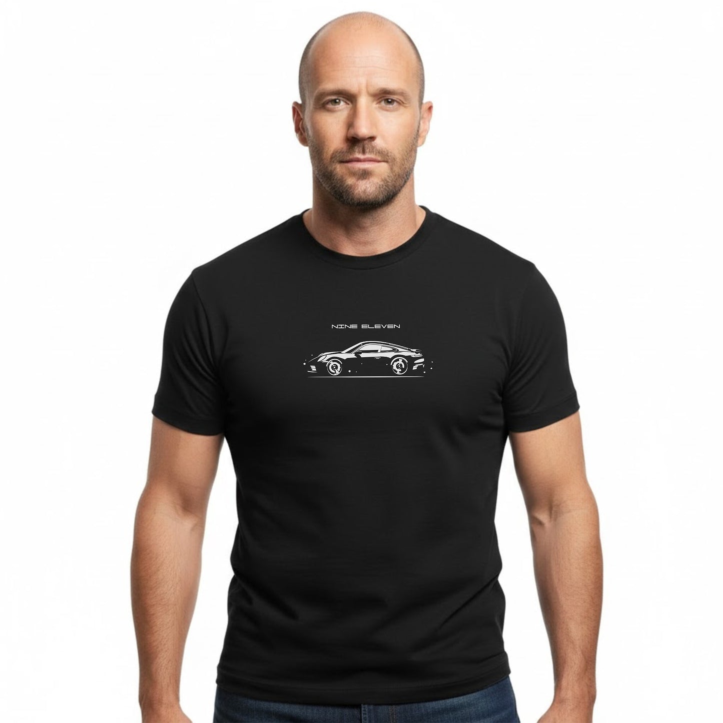 Man wearing a black t-shirt with a car design on a white background