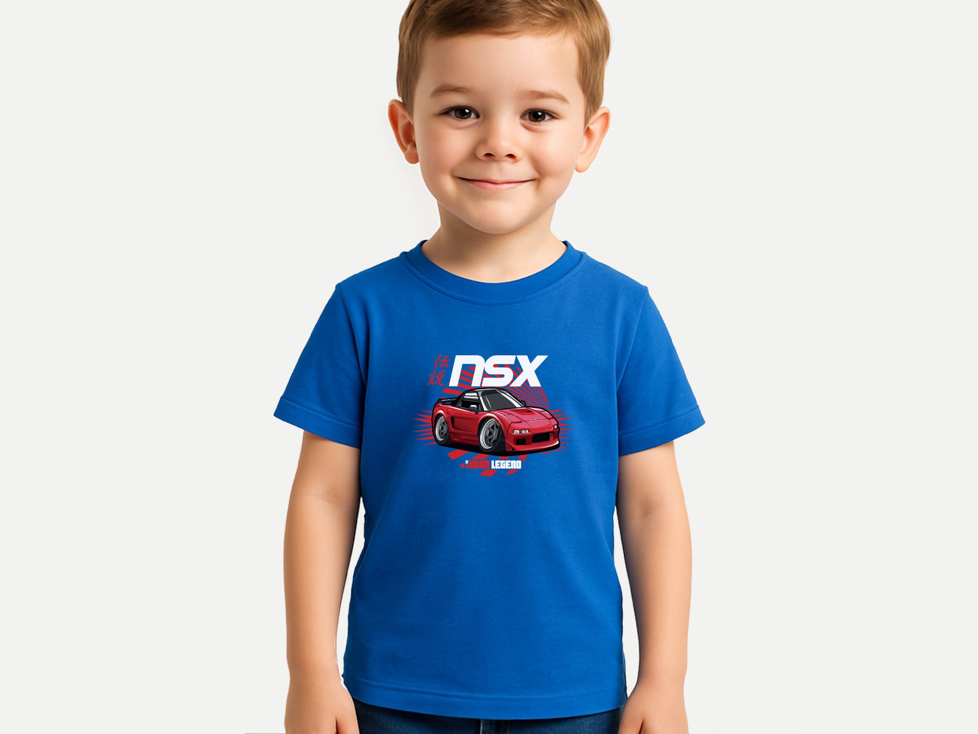 Child wearing a blue t-shirt with a red car graphic and 'NSX' text on a white background