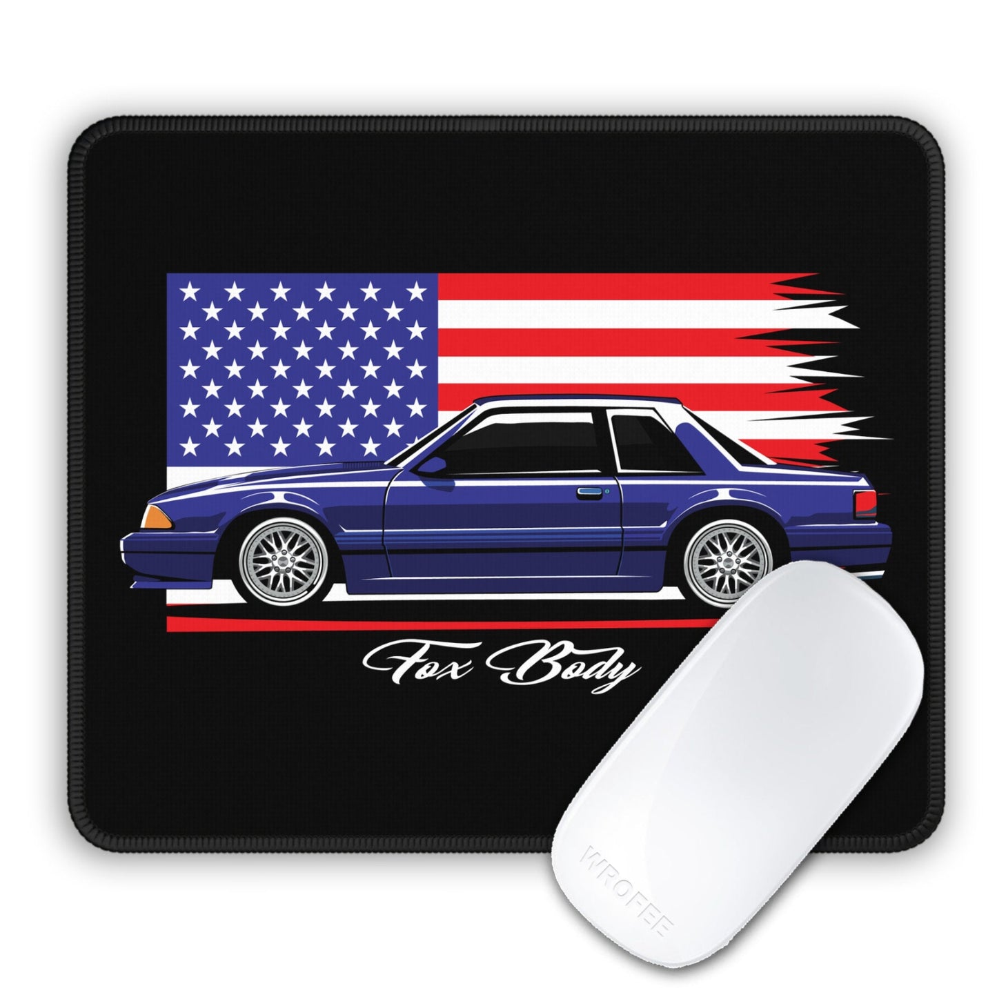Mouse pad with a car design featuring an American flag and 'Fox Body' text, accompanied by a white mouse.