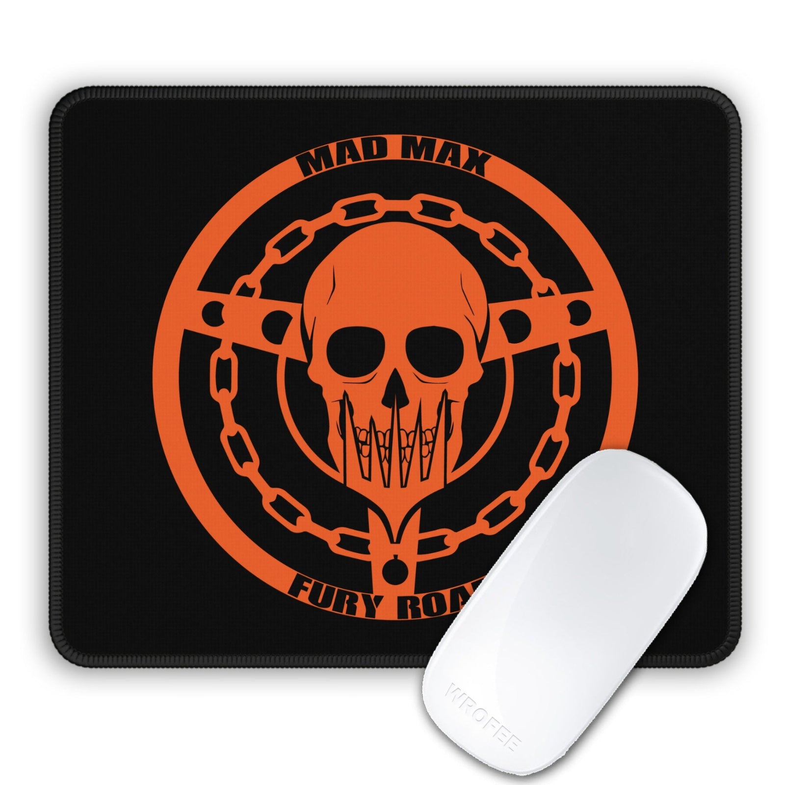 Mouse pad with a skull design and 'Mad Max: Fury Road' text, featuring a white mouse on a black background.