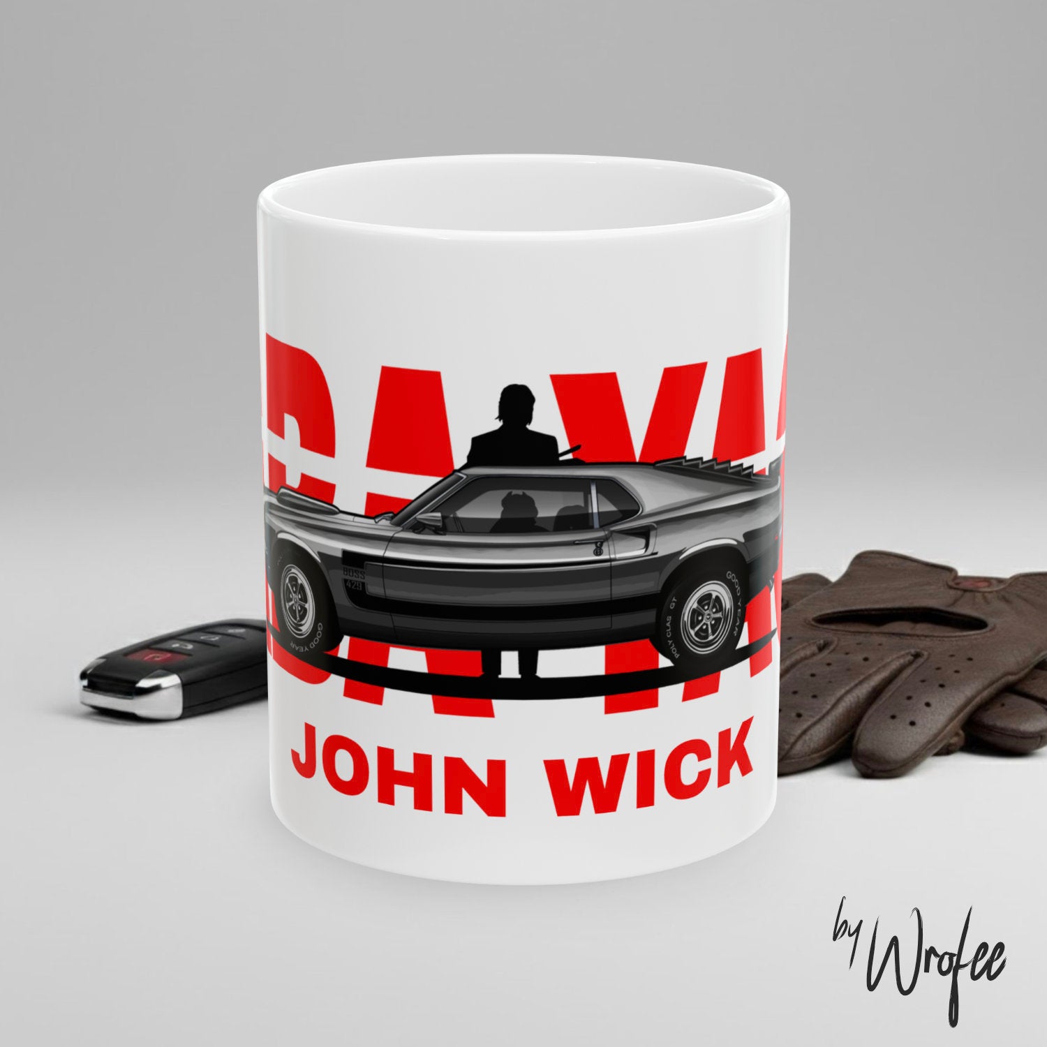 Mug with 'John Wick' design featuring a car and silhouette, on a gray background.