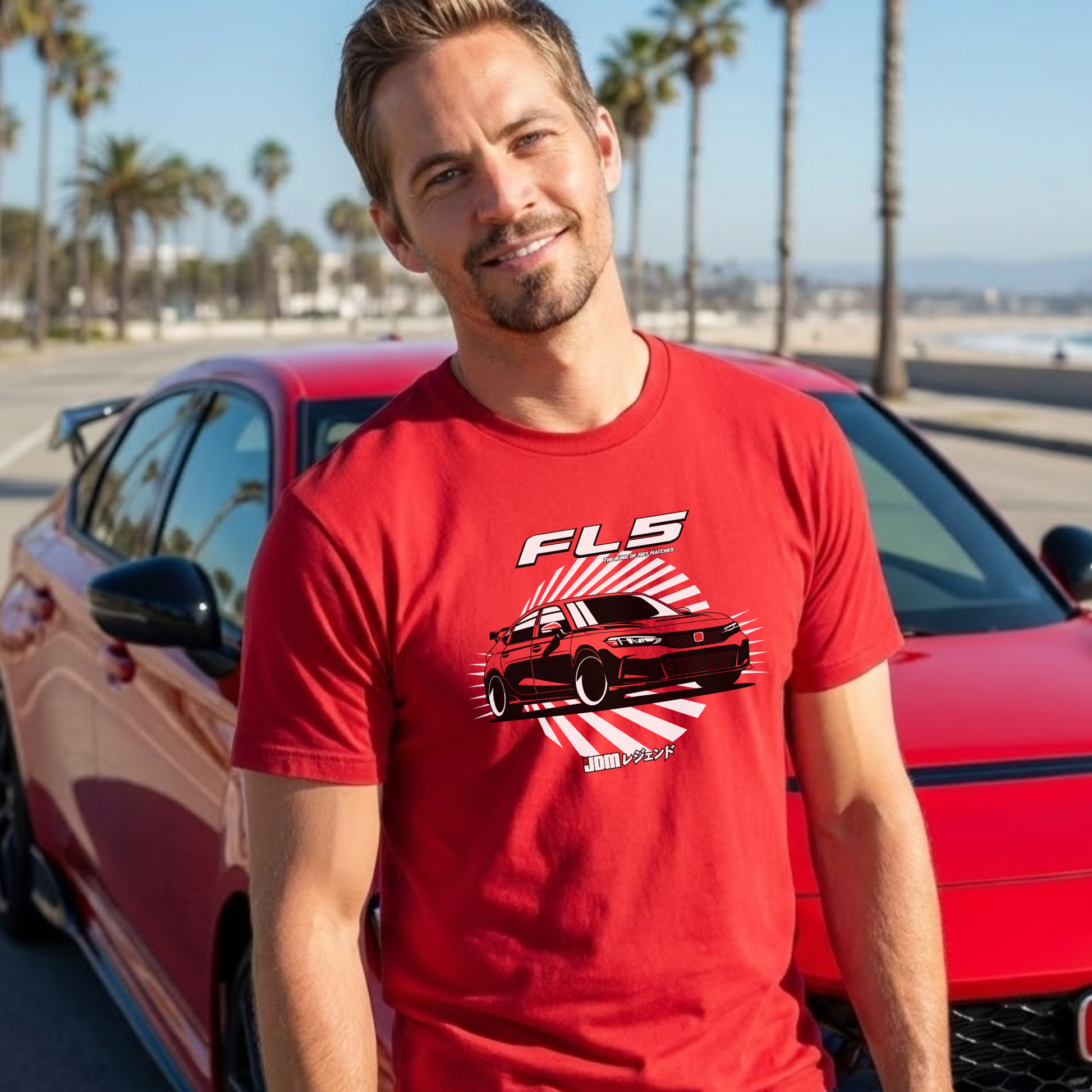 Man wearing a red t-shirt with a car graphic and 'FLS' logo, standing next to a red car with palm trees and beach in the background.