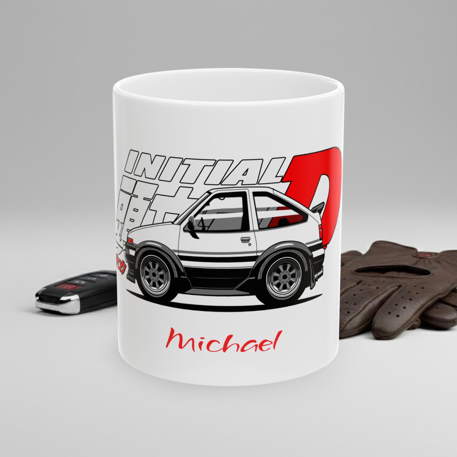 White mug with car design and 'Initial D' text on a gray background