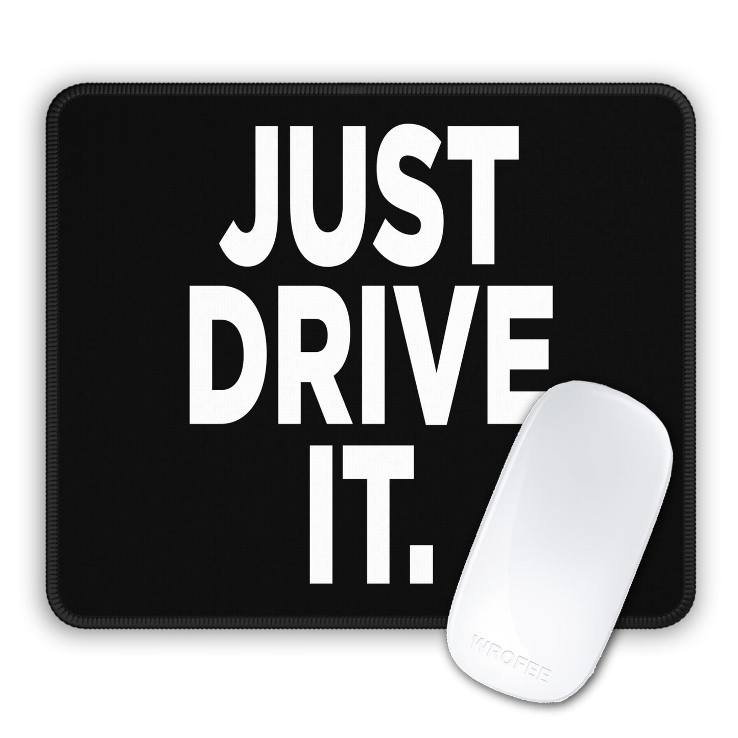 Black mouse pad with 'JUST DRIVE IT.' text and a white mouse on a white background