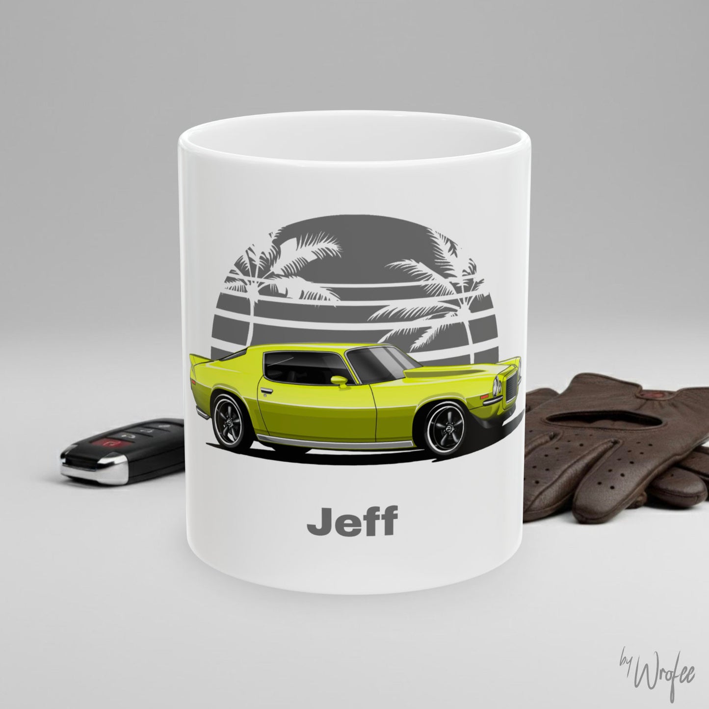 White mug with a lime green car design and 'Jeff' text on a gray background